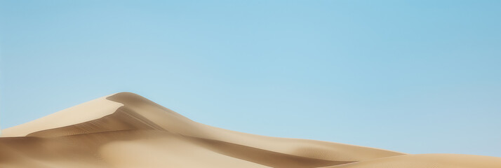 Majestic Sand Dunes Under Clear Blue Sky During Daytime in Desert Landscape