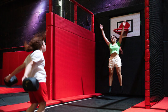 Friends enjoying an active day in a trampoline gym