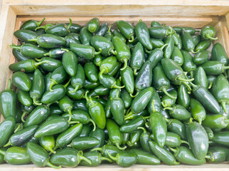 choosing pepper at the grocery store