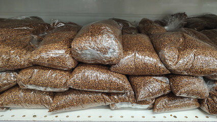 Many packages of buckwheat at the store