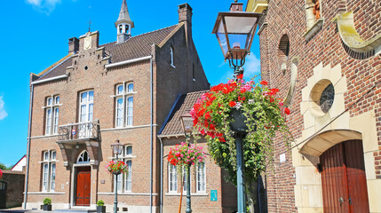 Stevensweert (Limburg), Netherlands - August 30. 2023: Historic museum building at market square of dutch village