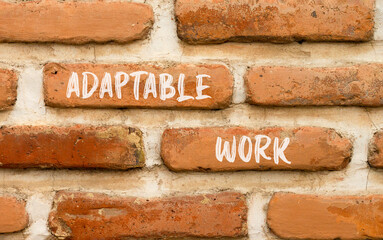 Adaptable work symbol. Concept words Adaptable work on beautiful brick wall. Beautiful red brown brick wall background. Business Adaptable work concept. Copy space.