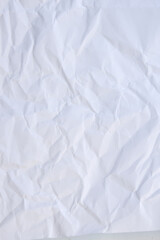 white crumpled textured paper vertical