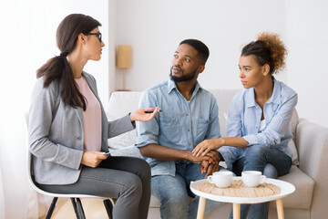 Professional Psychologist Advising African American Spouses Helping Them Restore Marriage In Office. Panorama