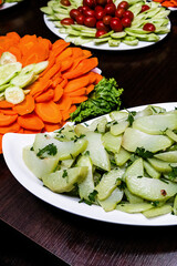 sliced ​​chayote on metal tray, food from self-service restaurant in Brazil, carrot in the background