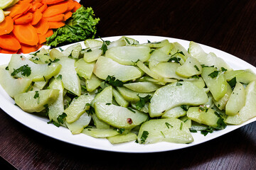 Sliced ​​chayote on metal tray, Brazilian self-service restaurant food