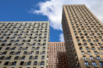 Fototapeta premium New residential buildings with boxes for air conditioners. House development, high-rise construction