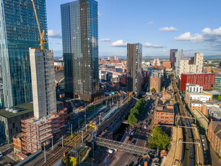 Aerial view of Deansgate area and Manchester cityscape under construction.