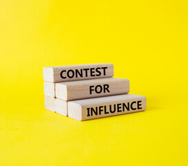Contest for Influence symbol. Wooden blocks with words Contest for Influence. Beautiful yellow...