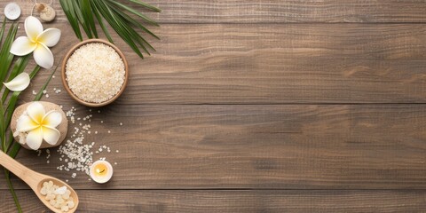 A calming arrangement featuring salt, a candle, and a plumeria flower, perfect for relaxation and wellness in a serene atmosphere