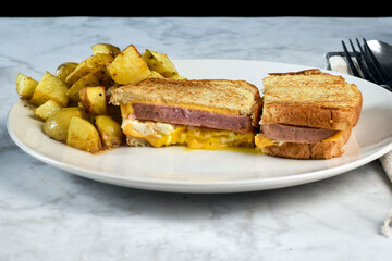 fried egg and spam melt breakfast sandwich