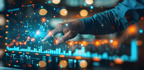A hand pointing at a digital graph to know more exactly the metrics
