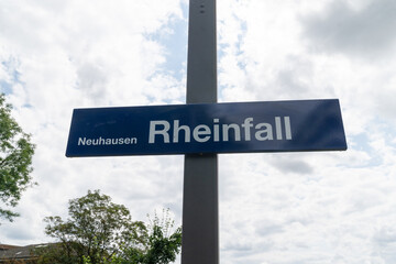 Obraz premium Train station stop for Neuhausen Rheinfall in Schaffhausen, Switzerland - sign