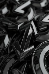 A pile of vintage-style metal letters in various shapes and sizes