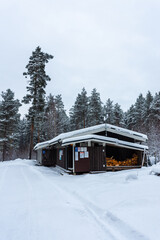 Wooden cottage in Finland forest in  winter