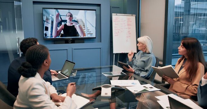 Office, people and television screen on conference meeting for virtual consultation and planning. Business, employees and video call or seminar for strategy, collaboration and teamwork in New York