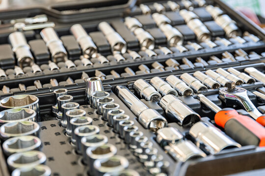 Socket set with socket wrench. Toolkit for the car maintenance