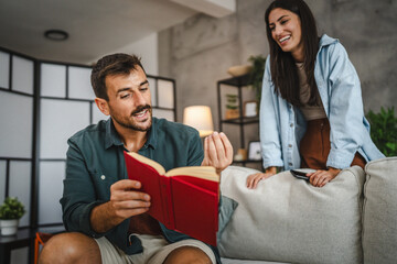 Boyfriend show and explain interesting part of book to his girlfriend