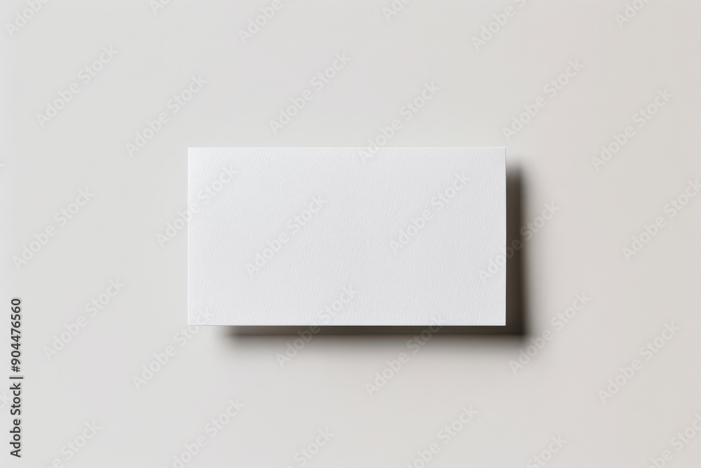 Poster This image shows a white rectangular card displayed on a light gray background, exemplifying minimalistic and modern design without any text or illustration.