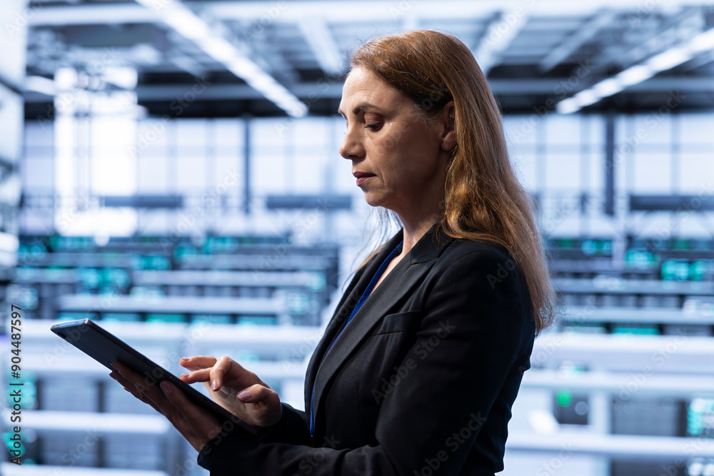 Poster data center software developer ensuring safety and security of database using tablet. cybersecurity 