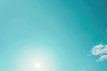 A person holding a kite string standing in open field with kite flying high in the sky, suitable for use as background or illustration
