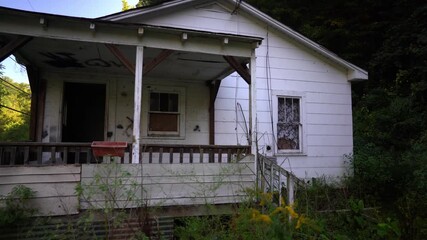 Haunting scene of abandoned house in coal mining town in West Virginia.