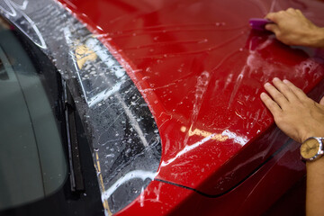Applying a Protective Film to a Vehicles Front End for Enhanced Protection and Style