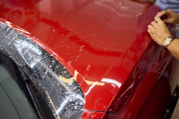 Applying a Protective Film to a Vehicles Front End for Enhanced Protection and Style