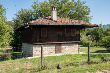 Old traditional country house closeup on sunny summer day