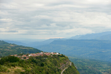 Barichara, the most beautiful town in Colombia, seen from a nearby lookout point, a touristic natural area with great views of the surrounding mountains.