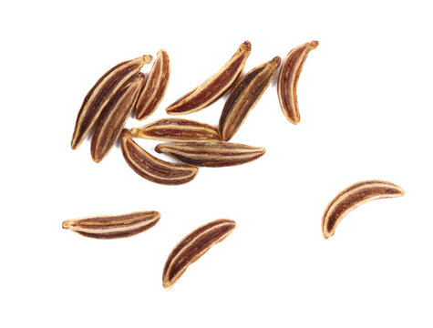 Cumin spice grains isolated on white, top view