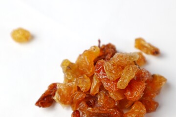 close up of raisins isolated on white