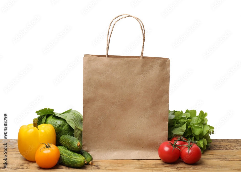 Poster Delivery of vegetarian products. Different vegetables and paper bag on wooden table