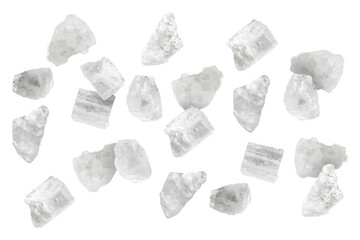 Sea salt crystals in air on white background
