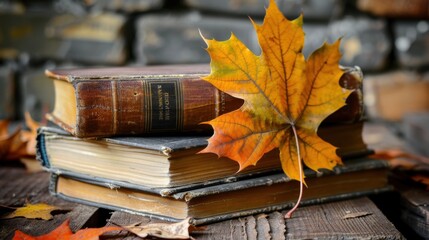 Vintage books with autumn leaves on a wooden surface, evoking the cozy charm of fall and the warmth of seasonal reading.