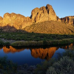 reflection of the mountain in the river