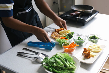 Preparing Chicken Steak With Plating Salad, Sausage And French Fries. Healthy Food Concept