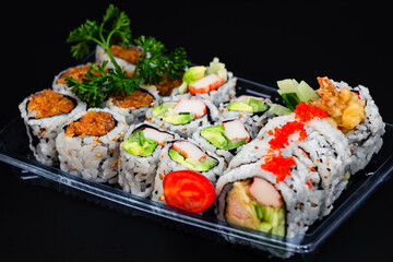 6 pieces of each California roll, Spicy salmon roll, and 5 pieces of small Dynamite roll