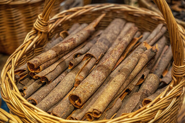 Whole Cinnamon Sticks in Traditional Woven Basket