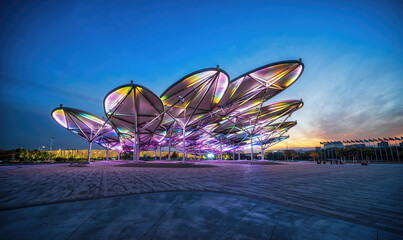 Futuristic Canopy Structure Against Twilight Sky in Urban Park