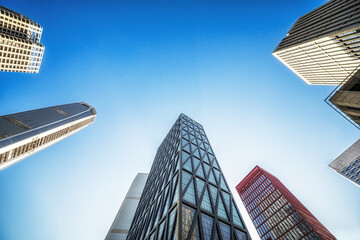 Modern Skyscrapers Soaring into Clear Blue Sky