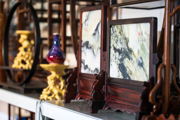 Elegant Display of Traditional Artifacts in a Cozy Interior