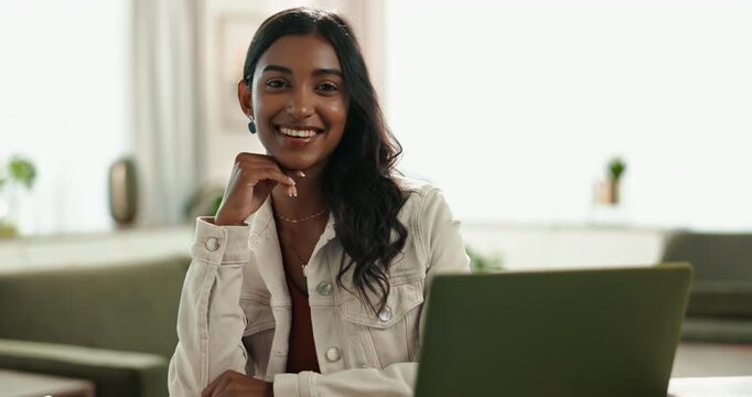 Laptop, Indian woman and home for online, smile or remote work from living room with computer. Lounge, happy or internet for language transcriber, technology or website for freelance female person
