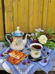 Coffee with pastries on a blue background