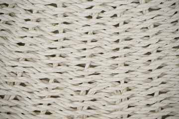 Close up photo of seamless pattern realistic texture of white woven rattan. The texture of the wooden rug seagrass rattan carpet background for design. Rattan texture