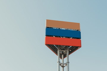 Urban colorful modern structure billboard with blue sky background