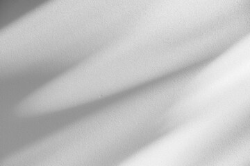 Studio style background wall decoration presentation uses white tones. with shadows cast from a nearby window, concept creating a decorative backdrop.