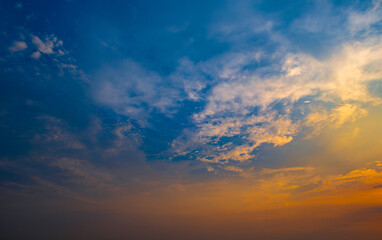 Enjoy a panoramic view of the skyline. The sun rises in the morning sky with colorful clouds. and beautiful cloud patterns In the soft light of the morning
