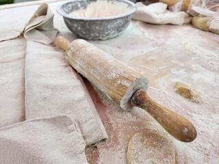 Homemade flour bread on wood background