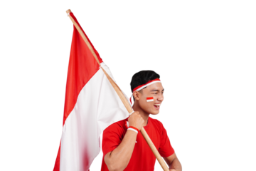 Indonesian man celebrating Indonesia's independence day on 17 August by holding the Indonesian flag isolated transparent